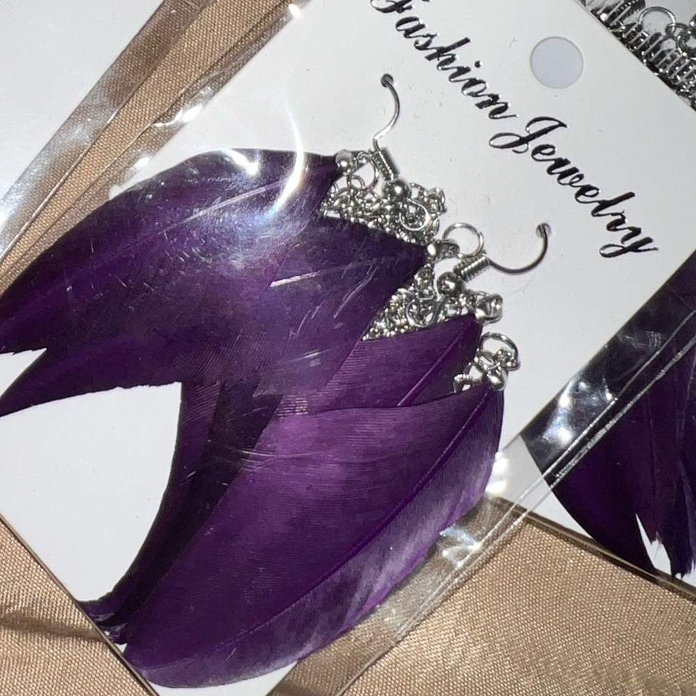 Feather earrings purple